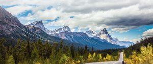 Picture of mountains on a sunny day with some clouds